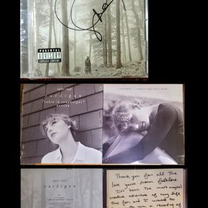 Taylor Swift Autographed Folklore CD & Cardigan Vinyl Records